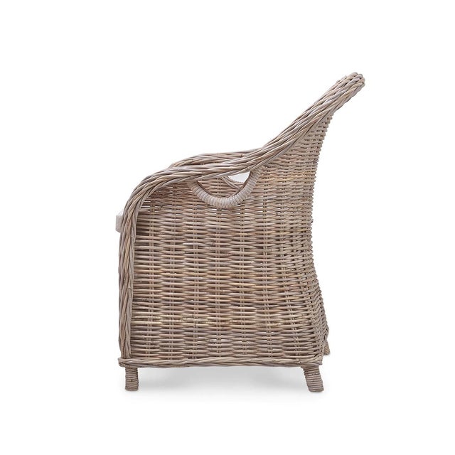 Featuring a beautifully woven natural rattan frame, this chair adds a fresh, breezy vibe to any setting. The performance...