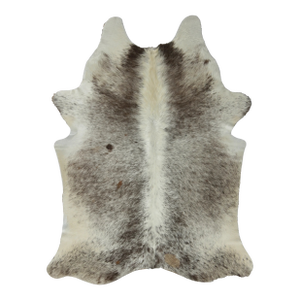 Rug & Kilim’s Contemporary Cowhide Rug With Natural Speckles in Black & White