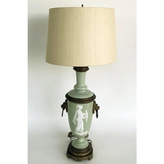 French Celadon Pâte-sur-pâte Porcelain Lamps with Custom Shantung Silk Shades PR Offered for sale is a pair of French...