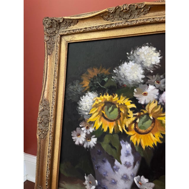Lovely still life featuring sun flowers and hydrangeas in a blu and white vessel. Great ornate frame. Singed. Immaculate...