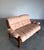 Vintage 1970’s Norwegian 2 seat sofa loveseat by Ekornes, the ‘Montana’ model. Sculptural solid teak frame with pale peach...