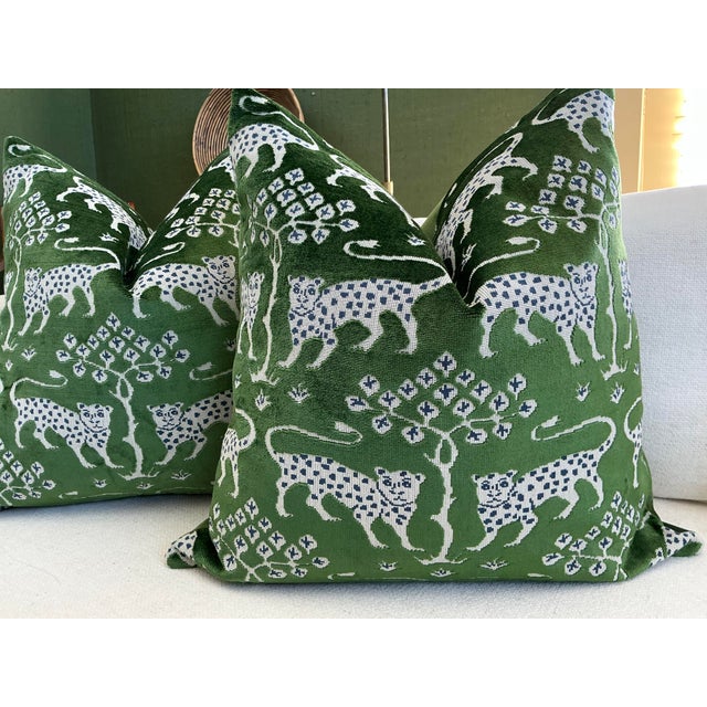 Inspired by a rich archive of historic paintings and textiles, this striking leopard-and-tree motif is reimagined in a...