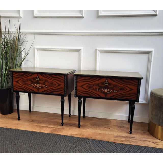 Very elegant and refined Italian 1950s neoclassical pair of bedside tables with front flip opening and great pattern...