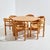 Pinewood dining set from the 1980s designed by Rainer Daumiller for Hanex. with several scratches, stains and surface...