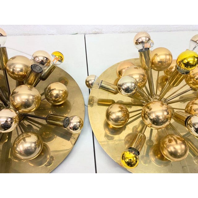 Two wall or ceiling lamps from the 1960s and 1970s, 11 lights, E14 socket, by Cosack, label on the back. Brass, brass-...