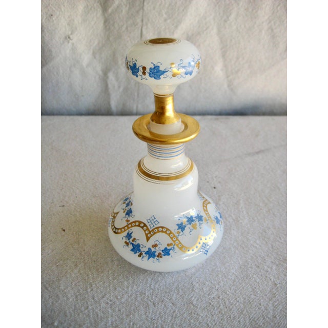 This splendid Opaline perfume bottle is a typical work from a very famous and popular glass maker know for his high end...