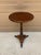 A handsome Regency-style drinks table crafted in rich solid walnut. The elegant turned pedestal and tripod base with brass...