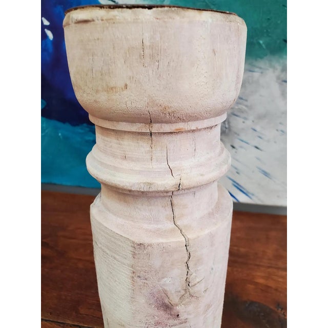 A charming pair of 19th-century French Provincial candlesticks, turned from solid beech wood with a beautifully weathered...