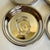 Here is a set of four vintage mercury glass coasters featuring recessed classical warrior profiles. Each round coaster is...