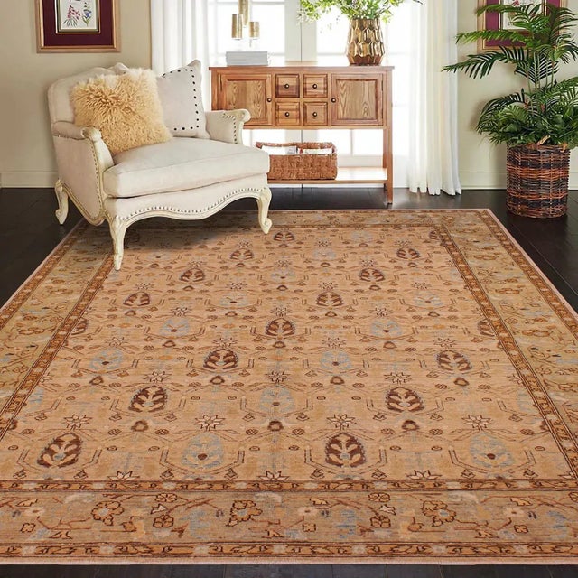 "Enhance the ambiance of your home with this magnificent Persian-influenced Turkish hand-knotted rug made by skilled...