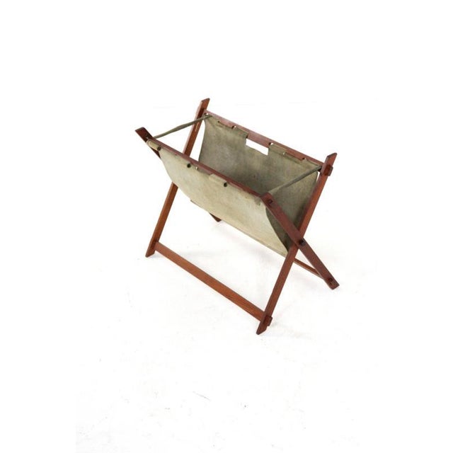 Nice magazine rack with teak frame and holder in attractive leather/suede. Cool and typical Danish design with warm...