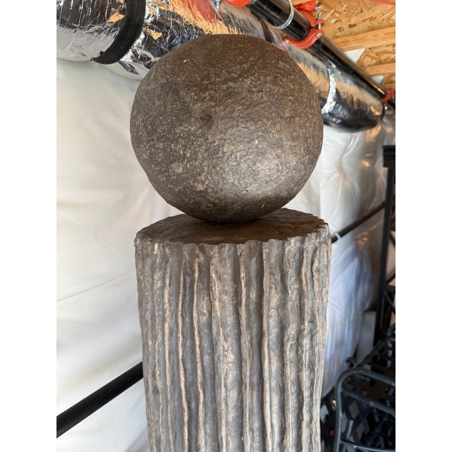 The Andre Totem is a beautiful oversized sculptural totem crafted from delicate paper mache atop a wooden base for...