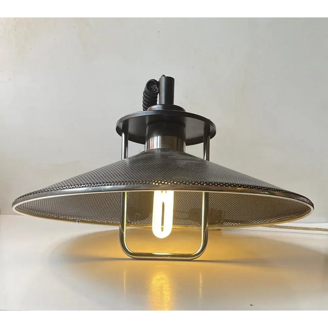 A stylish height adjustable vintage danish hanging lamp. In denmark used over an architects, artist or studio work-space...