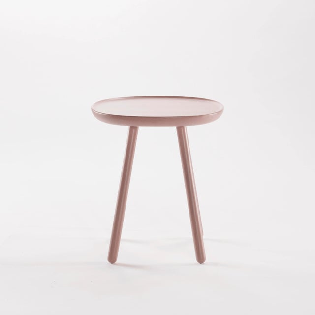The Na&iuml;ve series of side tables is available in three sizes, each carved out of a single piece of solid ash. A form...