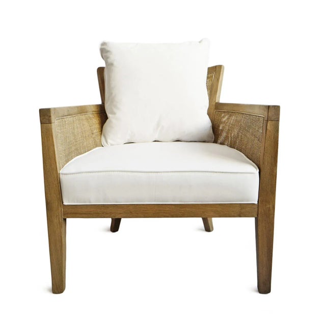 Attractive natural oak wood frame arm chair with cane inset panels on sides and back. Cotton linen blend upholstered...