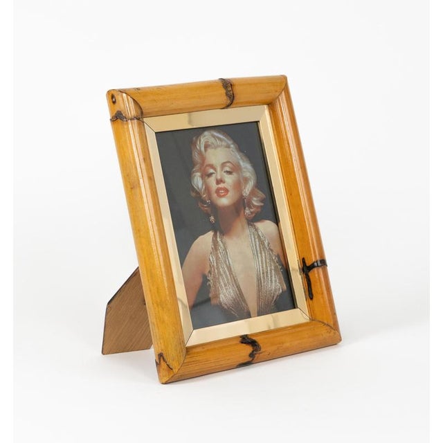 Midcentury beautiful rectangular picture frame in bamboo, brass and glass in the style of Gabriella Crespi. Made in Italy...