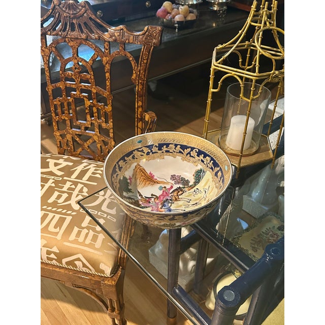 This is a vintage Chinese export-style porcelain bowl featuring a wonderfully detailed English equestrian fox hunt scene...