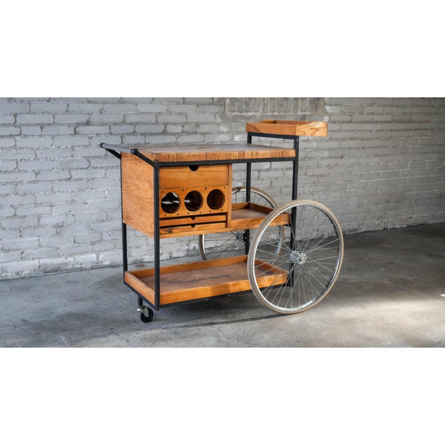 An exceptional and highly collectible Mid-Century Modern bar cart designed by Arthur Umanoff for David Morgan, circa...