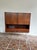 Highboard in rosewood. Thanks to its striking grain, it is always a stylish eye-catcher in any interior. manufacturer:...