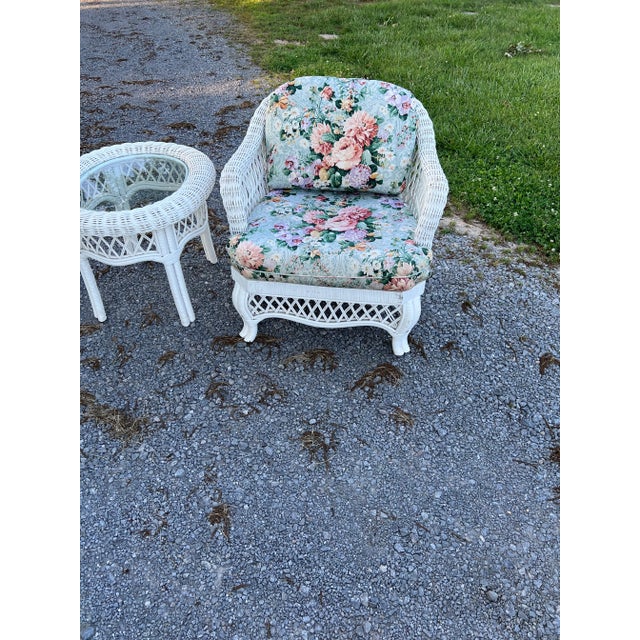 Lane Venture Wicker Sofa & Chair along with Two Side Tables in a Beautiful Design . Comes with Floral Cushions that could...