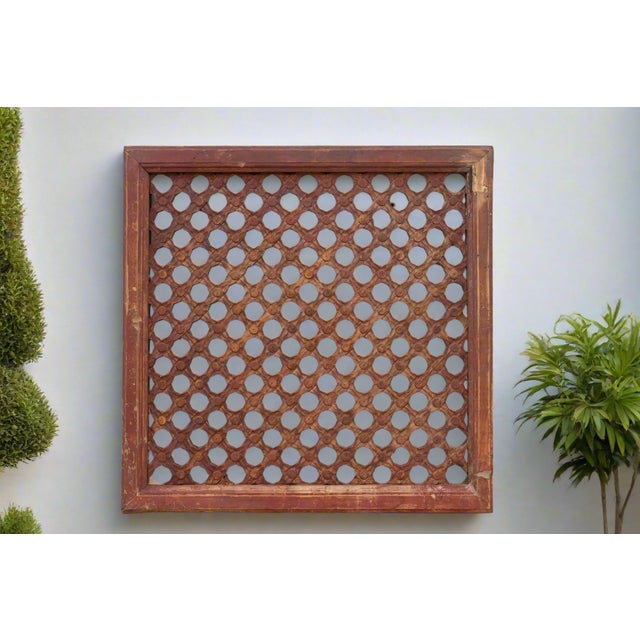 A traditional architectural feature of Chinese buildings, this beautiful antique Chinese lattice window was prominent in...