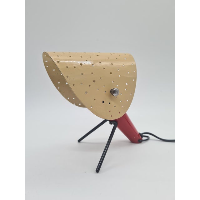 An original, collectible table lamp from the mid-20th century – an extremely rare piece combining avant-garde design with...