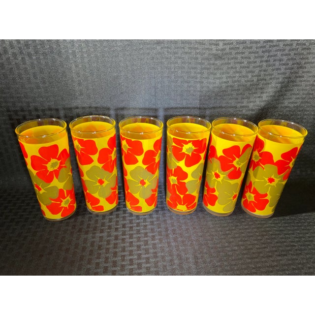 An amazing upbeat design brings you back to the 60,s-70's of bright and colorful Hibiscus flowers makes this glassware set...
