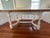 Large farm-house style draw-leaf dining table in beautiful condition. Solid wood top is in excellent condition. Leaves...