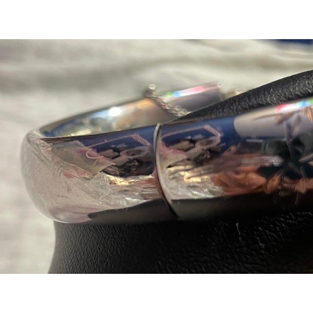 Engraved sterling silver bangle, lightly engraved with floral engraving, high polish, marked base metal sterling silver by...