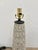 Stylish Currey & Co Cipher Lamp. Oval pattern on black round base. Showroom floor sample.