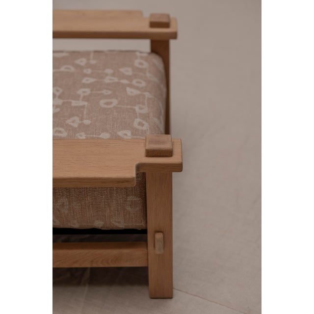 Beautiful mid century easy chair crafted from solid oak, made in Denmark circa 1960. The design clearly reflects the...