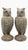 This is a striking pair of vintage garden statues depicting Great Horned Owls, masterfully crafted in England. Cast in...