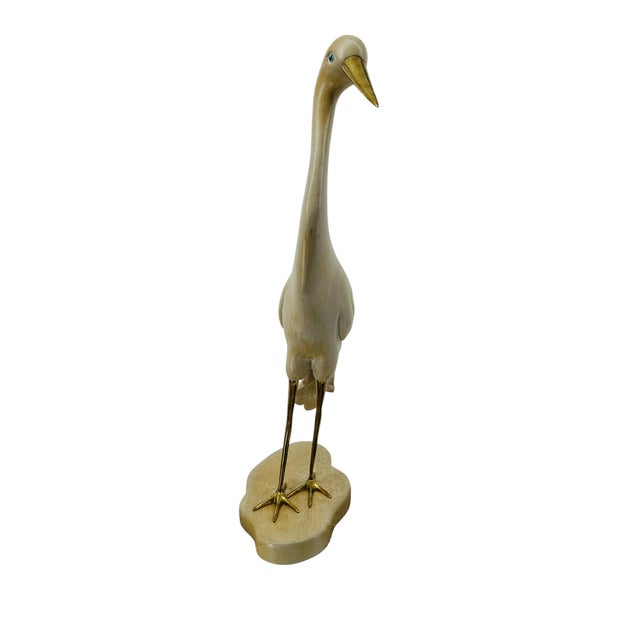 Elevate your home decor with this stunning, large vintage crane sculpture, dating back to the 1980s. This elegant piece...
