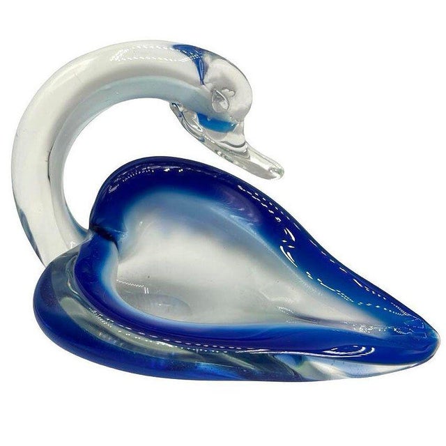 Original hand-blown art glass swan dish features a swan with its head resting near its wing. Made from clear glass with...