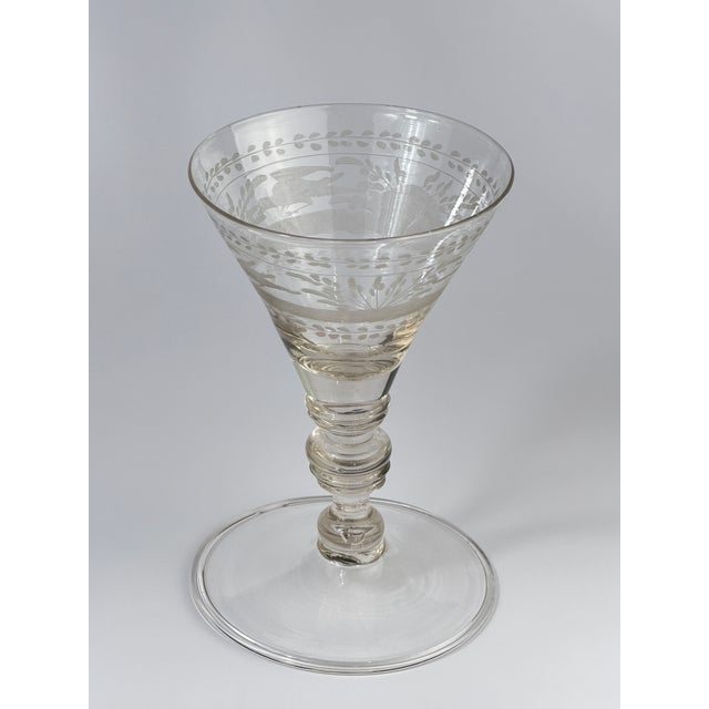 uthentic 18th-century Bohemian engraved wine glass, hand-blown and decorated with finely executed wheel-engraved foliate...