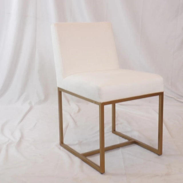 The Emery Dining Side Chairs offer a clean, tailored look with a modern architectural edge. Upholstered in a soft, neutral...