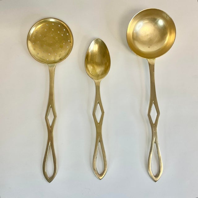 Vintage Home is pleased to offer this stunning set of 3 Brass Serving Spoons. These are from the 1970s and will add a...
