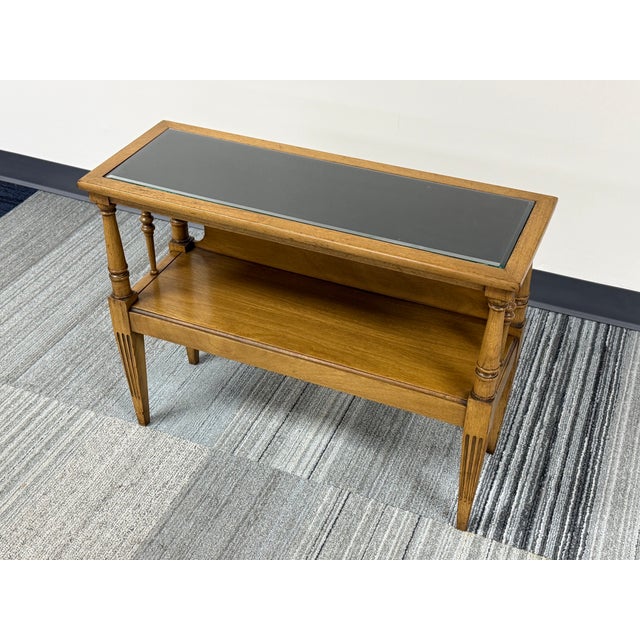 -NOTE: The glass insert on the top is clear while the table under the glass is black therefore making the glass look black...