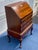 Elevate your home office or entryway with this exceptional mid-20th-century Queen Anne style slant-front secretary desk,...