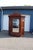This is a superb carved walnut Renaissance Revival Victorian era armoire of extraordinary design and scale. The carving...