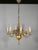 Six Arm Antique Dutch Bronze Chandelier A six arm chandelier with decorative out-swept arms holding candlelight bulbs...
