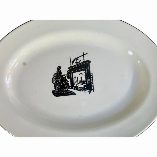 Vintage 1940s Harker Pottery Bakerite oval serving plate in the charming Colonial Lady pattern. This platter features a...