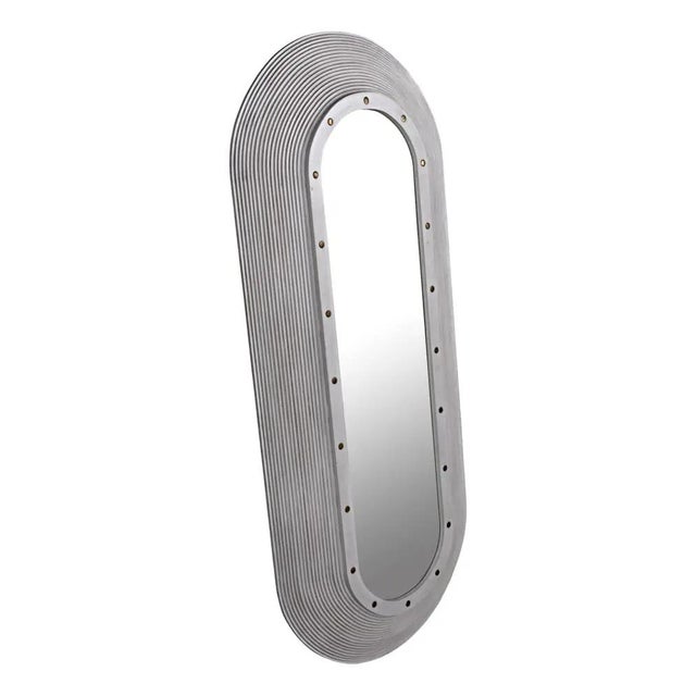 This full-length wall mahogany mirror features a substantial racetrack frame embellished with repeating rings of hand-...