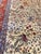 An exceptional, large-scale vintage Kashmar rug featuring an intricate polychrome hunting scene set against a classic...