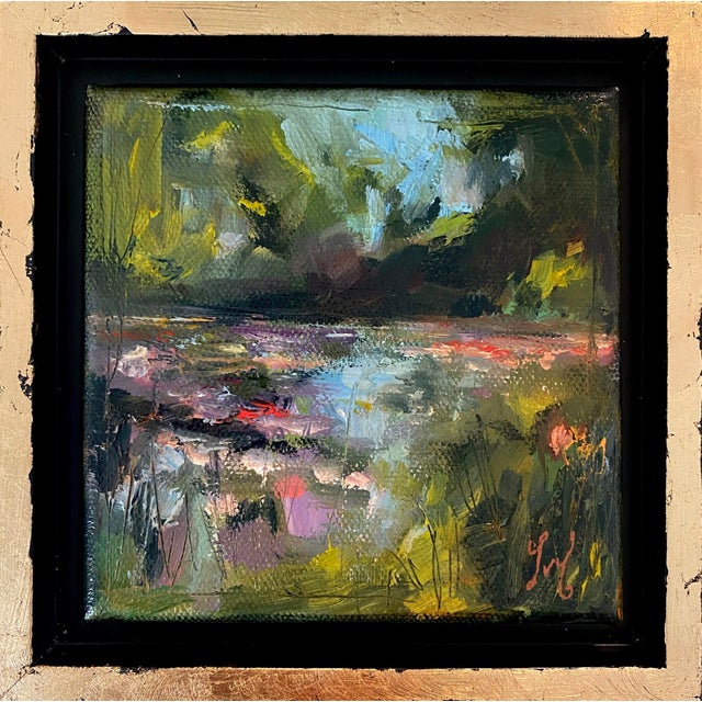 This oil on canvas artwork captures a serene garden scene reminiscent of Monet's iconic water lilies, with vibrant strokes...