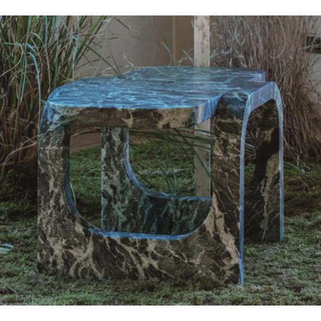 Cut and fold coffee table by dAM Atelier Dimensions: L78 x W48 x H40 cm. Materials: Verde Alpi Mable. Cutting and folding...