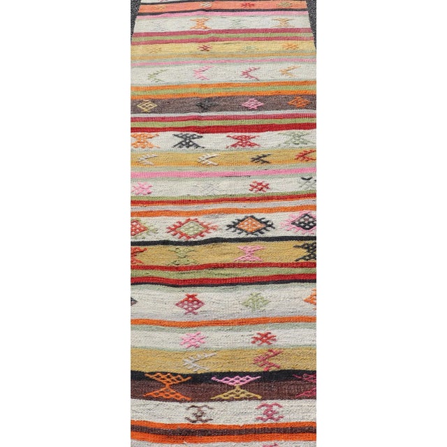 Mid 20th Century Vintage Hand Woven Turkish Kilim Colorful Stripe Runner With Tribal Motifs For Sale - Image 4 of 12