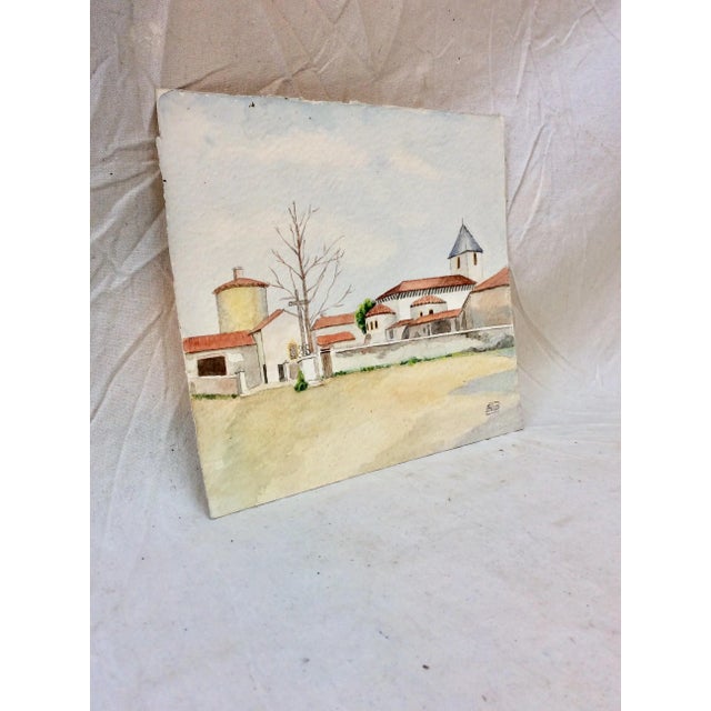 This is a beautiful French artist rendition a section of the village of Ouches near Roanne, France in the Loire Valley of...