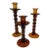 Set of Three Amber Colored Glass Candlesticks For Sale