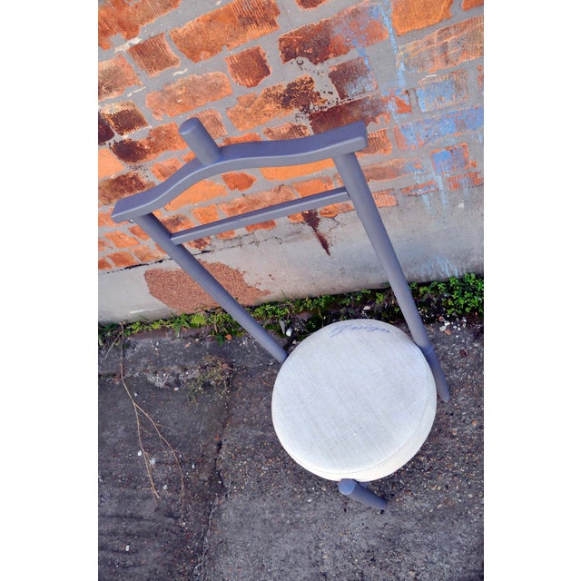 Vintage valet stand from the mid-century era, fully renewed with fresh paint and reupholstered using original linen....